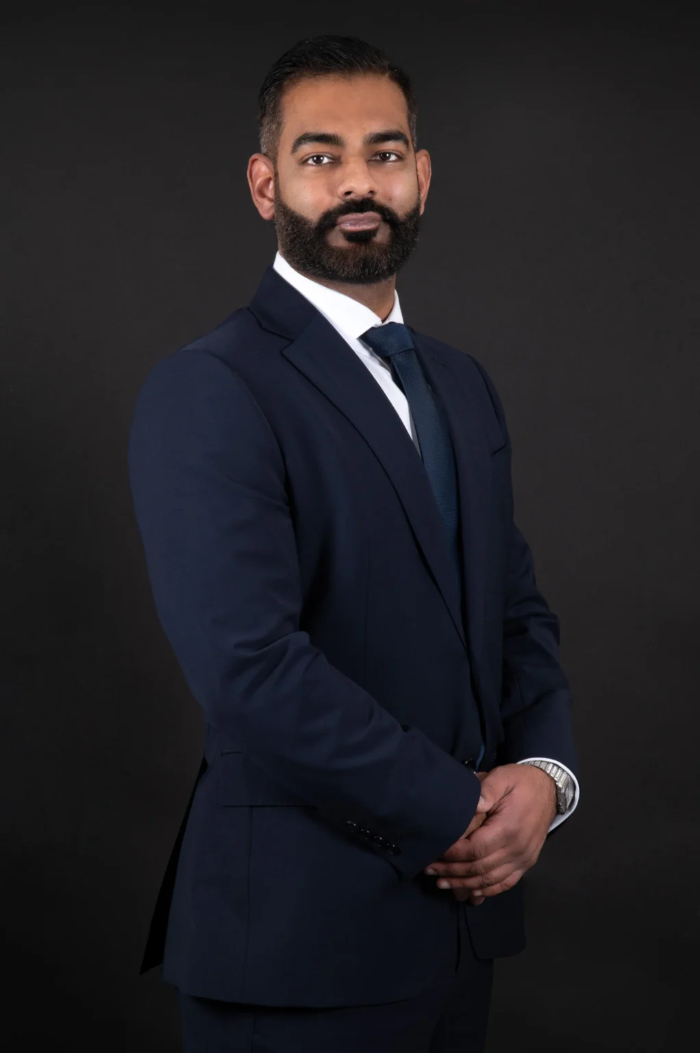 Mr. Kam Cheema